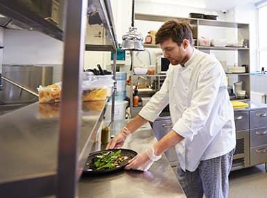prepping food in restauraunt
