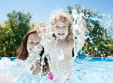 mother and son in pool